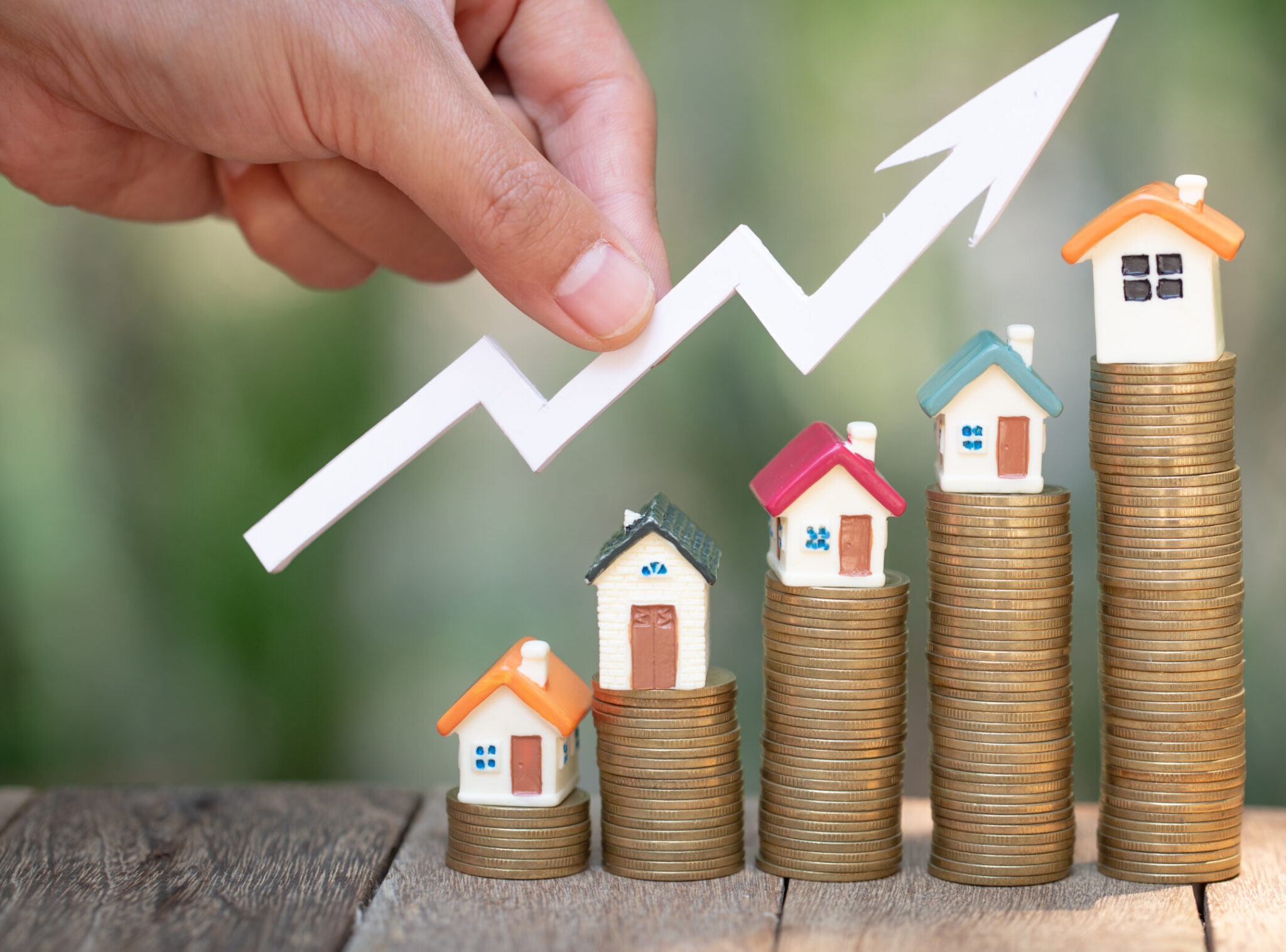 planning savings money of coins to buy a home, concept for property ladder, mortgage and real estate investment. for saving or investment for a house, growing business