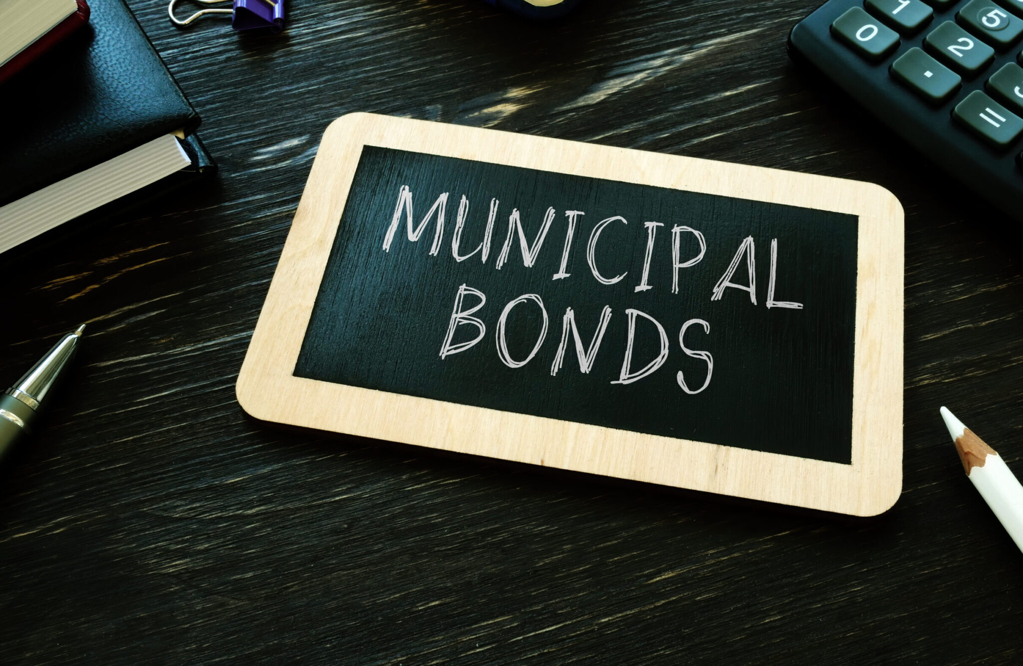 Municipal bonds written on the small blackboard.